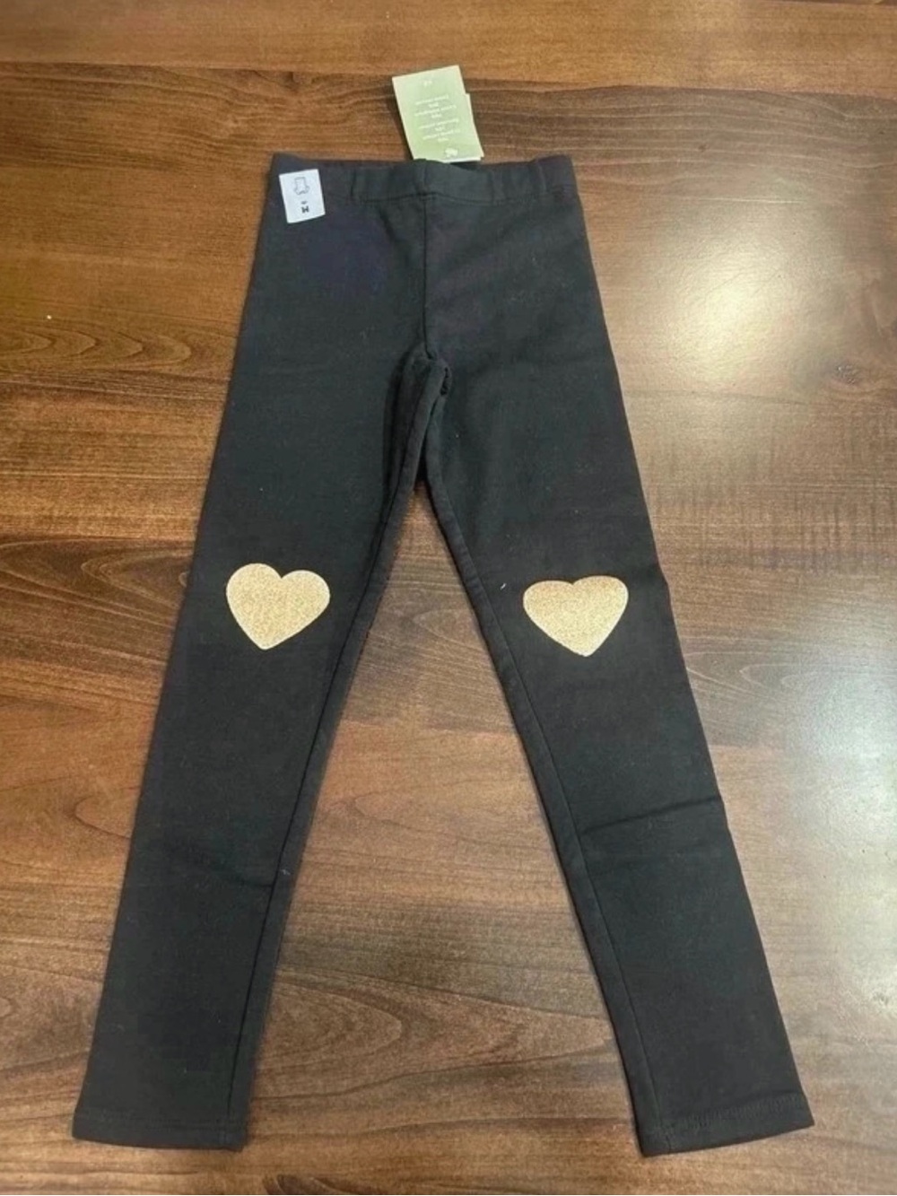 H&M Black Leggings with Gold Heart Knee Details